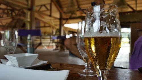 Close-up of beer on table