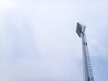 Low angle view of ferris wheel against sky