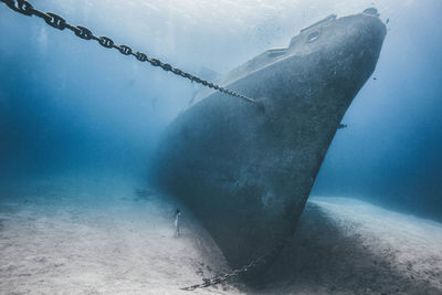 Abandoned boat in sea