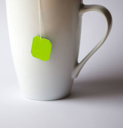 Close-up of mug with tea bag