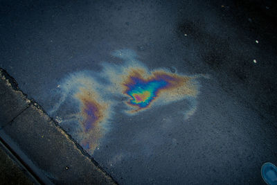 High angle view of rainbow on road