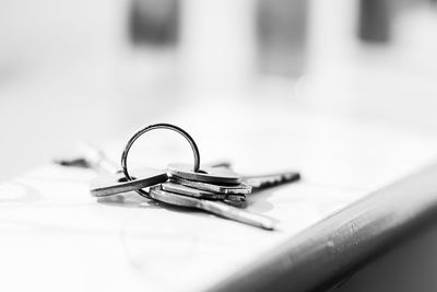 Close-up of chain on table