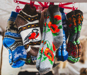 Close-up of clothes hanging on rack