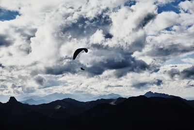 Low angle view of silhouette mountain against sky