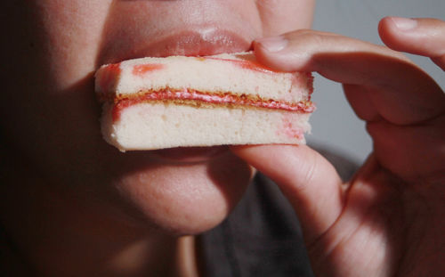 Close-up of hand holding ice cream