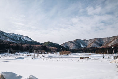 Scenic view of snowcapped mountains against sky