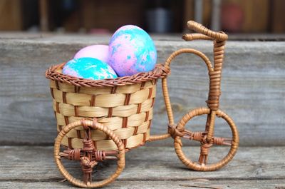 Close-up of multi colored wicker basket on table