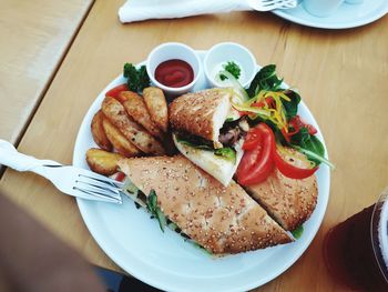 High angle view of breakfast served on table