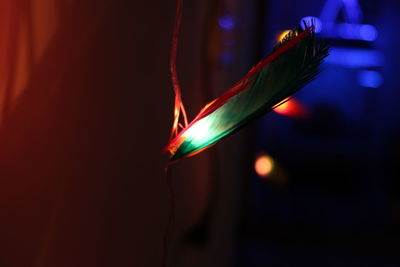 Close-up of illuminated lights against blurred background
