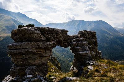 Scenic view of rocky mountains against sky in montefortino, marche italy