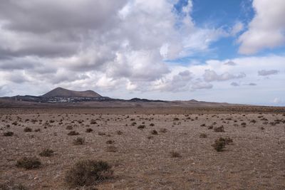 Scenic view of desert against sky