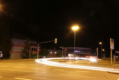 Illuminated street light at night