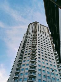 Low angle view of modern building against sky