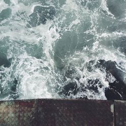 Waves splashing on rocks