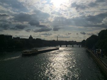 View of river against cloudy sky