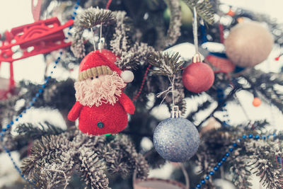 Close-up of christmas decoration hanging on tree