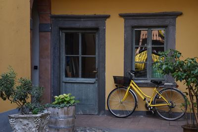 Bicycle parked outside building