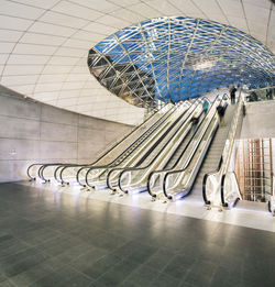 Blurred motion of people on escalators at triangeln station