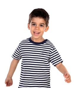 Portrait of smiling boy standing against white background