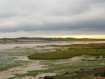 Scenic view of river against sky