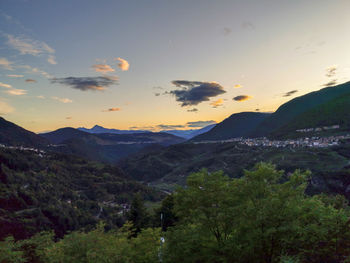 Scenic view of mountains against sky during sunset