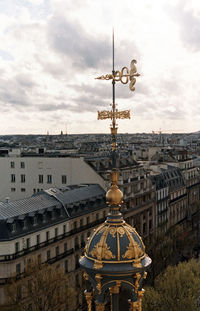 Building against cloudy sky