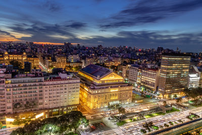 High angle view of illuminated buildings in city