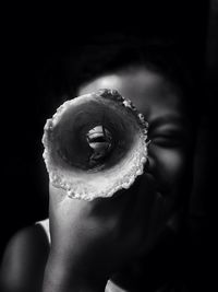 Close-up of child holding ice cream cone