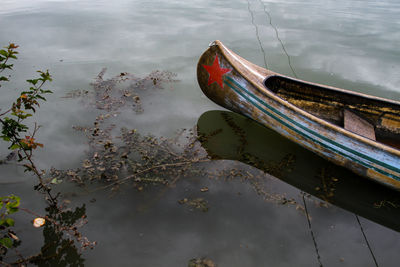 High angle view of boat moored in lake