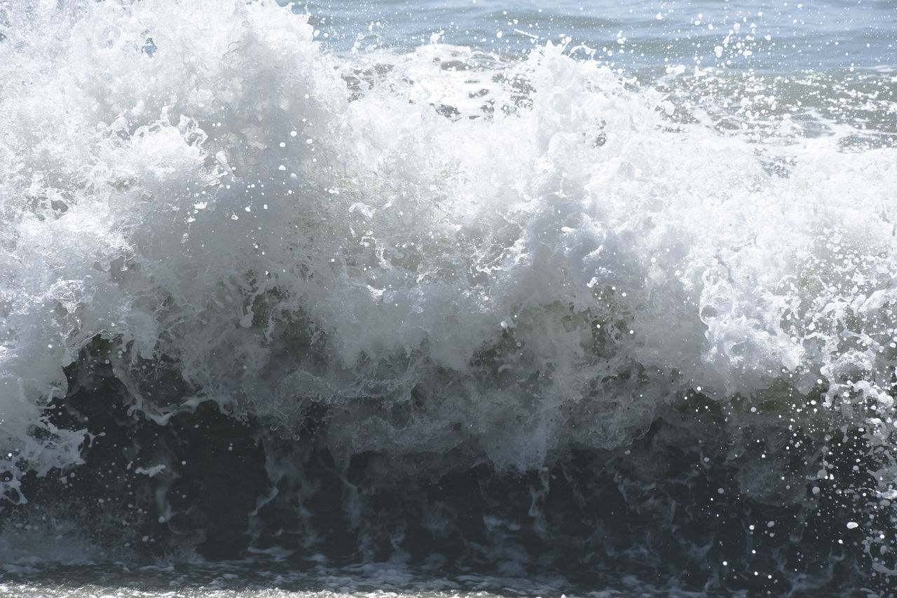 Wave hitting shore