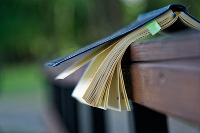 Notebook for write ideas lies on the bench in park