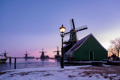 Traditional building against clear sky during winter