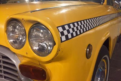 Close-up of yellow car