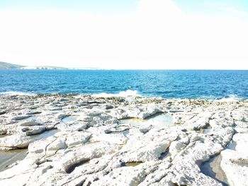 Scenic view of sea against clear sky