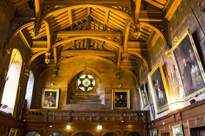 Low angle view of illuminated ceiling in building