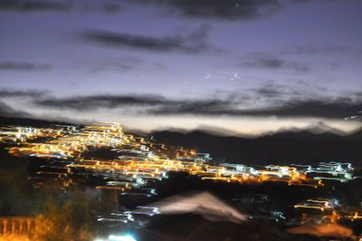 Aerial view of city at night