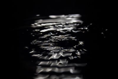 Close-up of glass over white background