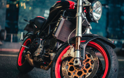 Close-up of motorcycle on road