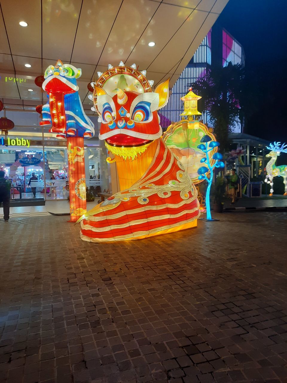 illuminated, night, architecture, multi colored, city, building exterior, built structure, decoration, celebration, no people, neon, light, outdoors, lighting equipment, arts culture and entertainment, holiday, sky, tradition