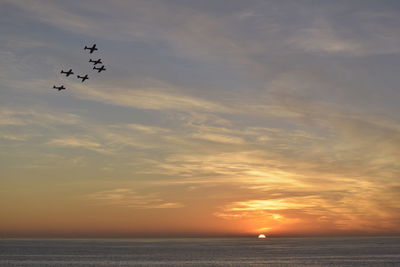 Scenic view of sunset over sea