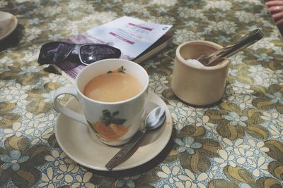 Close-up of tea cup on table