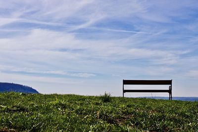 Scenic view of farm against sky