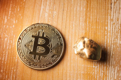 High angle view of coins on table