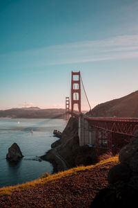 View of suspension bridge over sea