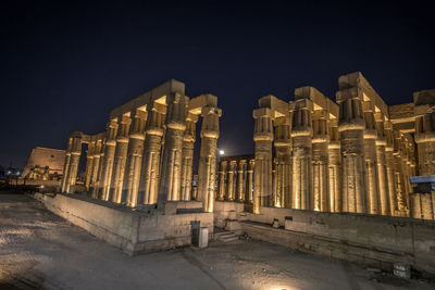 Old building against sky at night