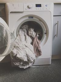 Cloths in washing machine at home