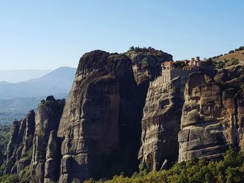 Panoramic view of rock formations against sky