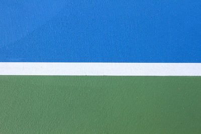 High angle view of arrow symbol on swimming pool