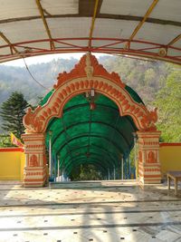 Entrance of temple against building