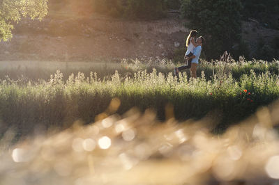 Woman standing on field